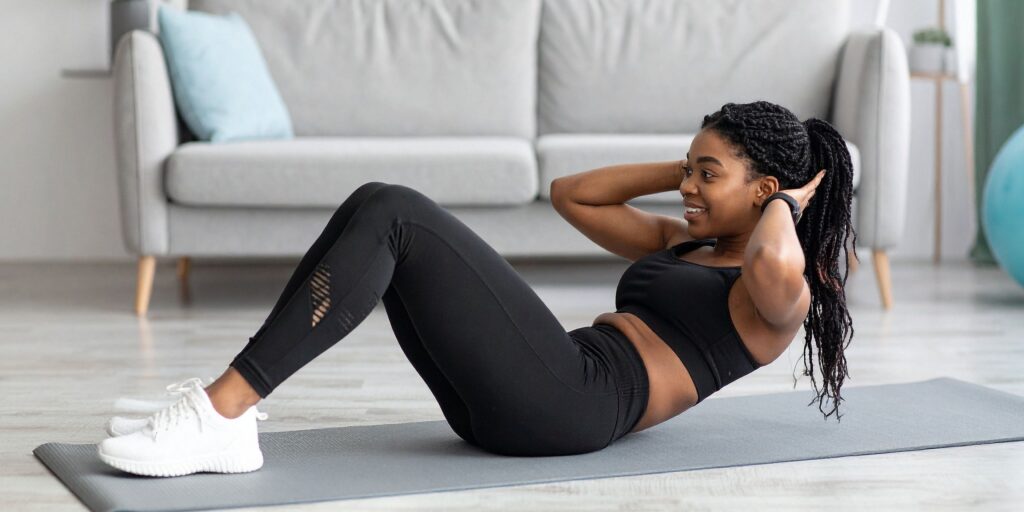 Person exercising indoors during winter maintaining circulation and immune health