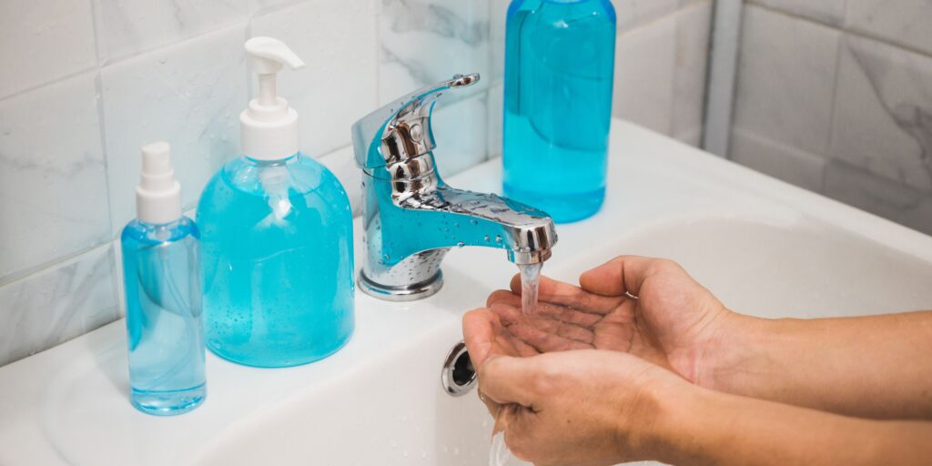 Proper handwashing technique showing soap and water method for preventing winter illness